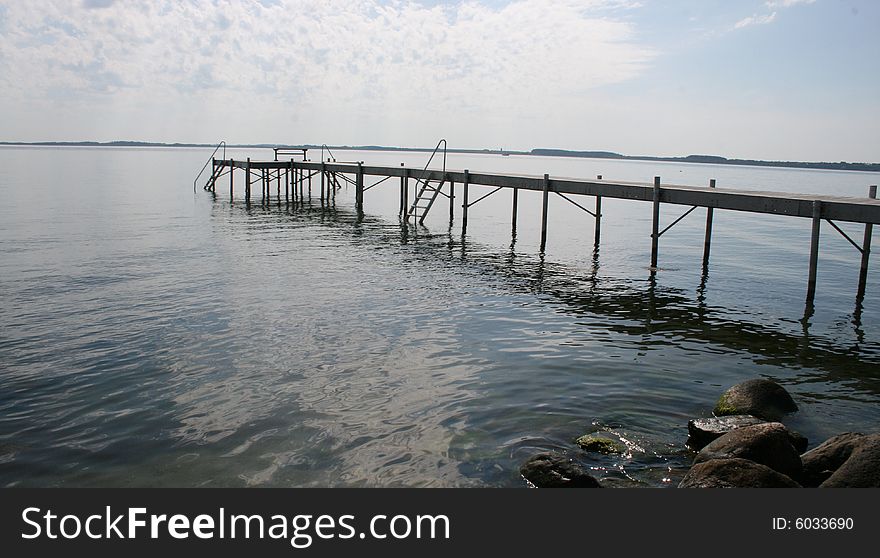A pier stretching out into Limfjorden, Denmark