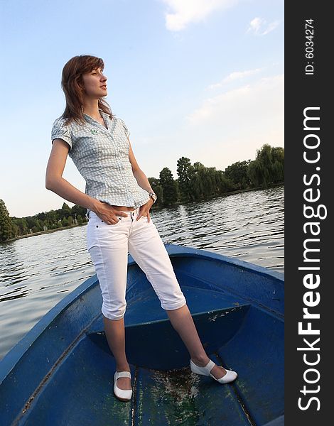 Girl Standing On A Boat