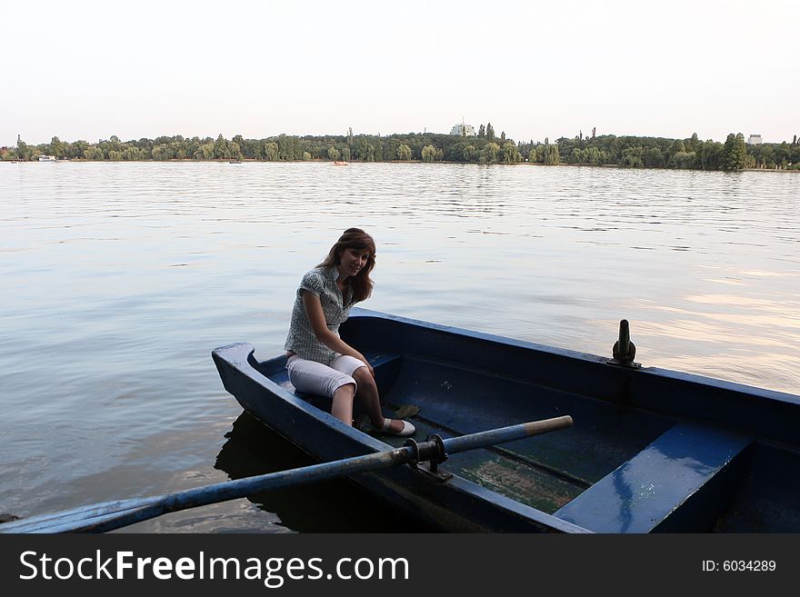 Girl rowing a boat