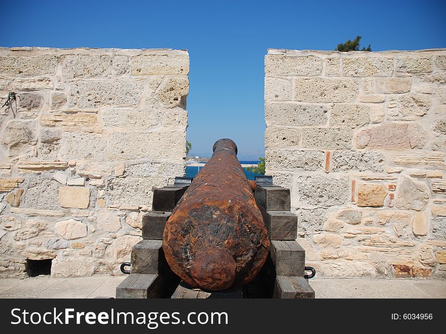 Cannon on castle near sea