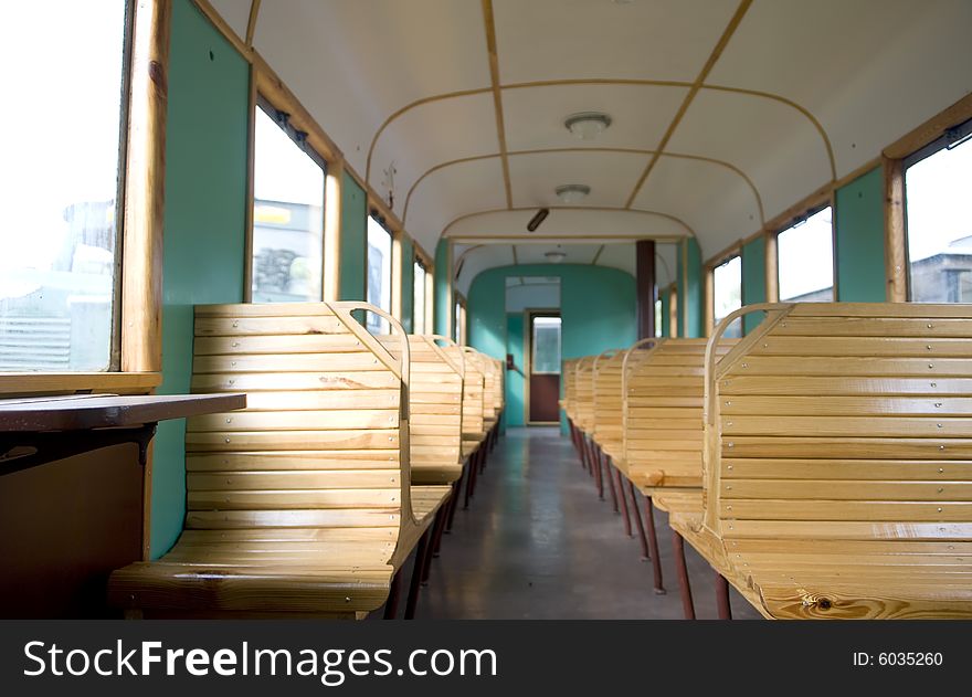 Old fashioned empty train with seats