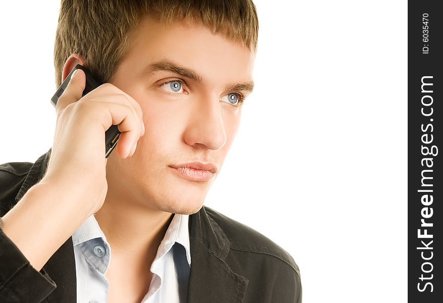 Young handsome man talking on the phone