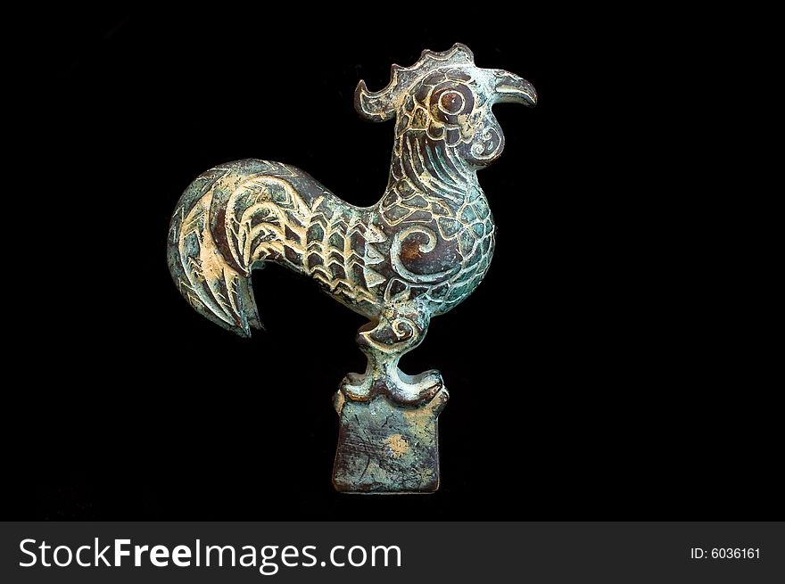Traditional metal rooster from China. The Rooster is one of the 12-year cycle of animals which appear in the Chinese zodiac. Traditional metal rooster from China. The Rooster is one of the 12-year cycle of animals which appear in the Chinese zodiac.