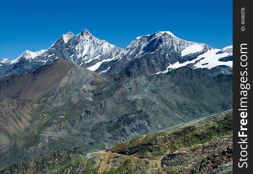 Dom is a summit of 4545 m in south of Switzerland, in Mattervispa valley. Dom is a summit of 4545 m in south of Switzerland, in Mattervispa valley.