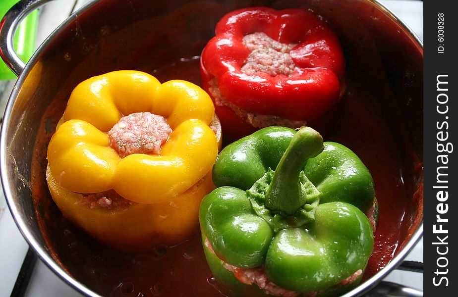 Colourful peppers filled with fresh meat. Colourful peppers filled with fresh meat