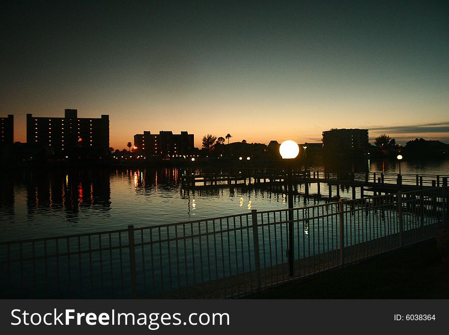 A view of city hotels along the water after sunset in Tampa, Florida. A view of city hotels along the water after sunset in Tampa, Florida.
