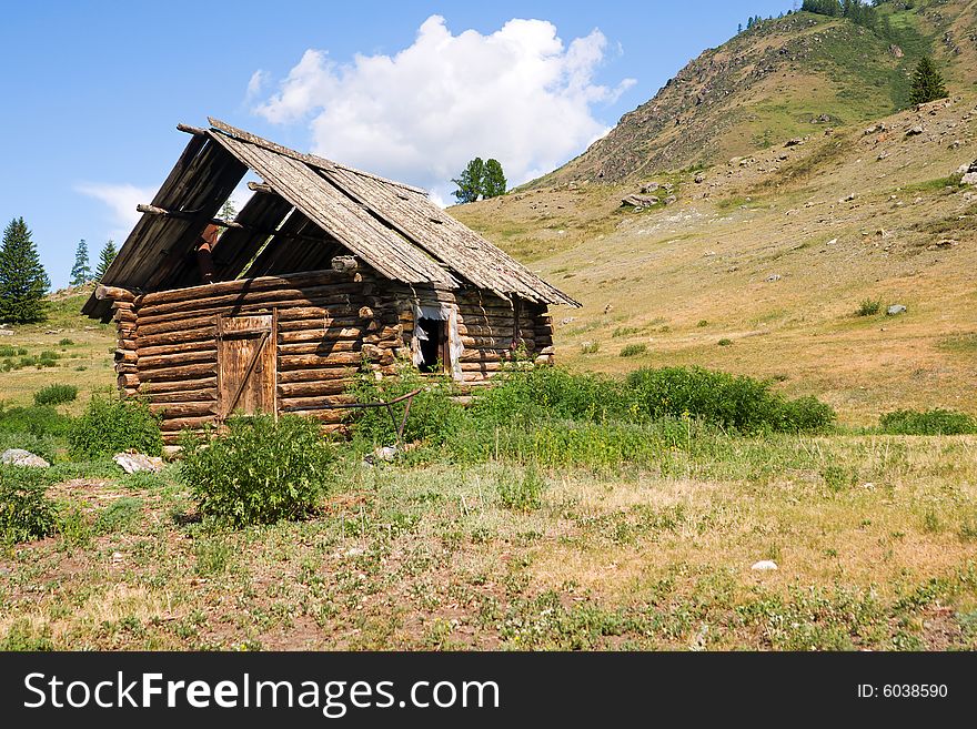 Deserted wood house in mountains. Deserted wood house in mountains