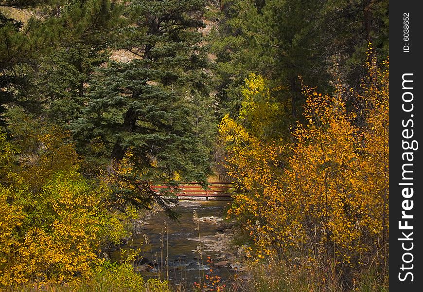 A bridge over the North Fork of the Big Thompson River in Glen Haven, Colorado. A bridge over the North Fork of the Big Thompson River in Glen Haven, Colorado.