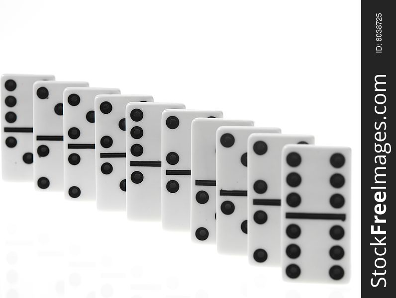 Dominoes on white background, close up