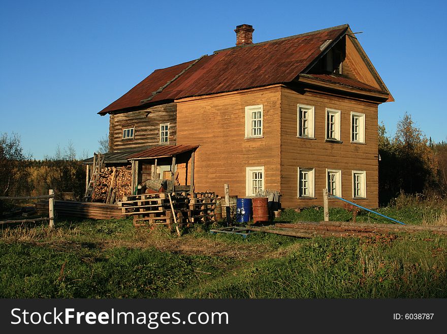 Old lodge in village in Russia