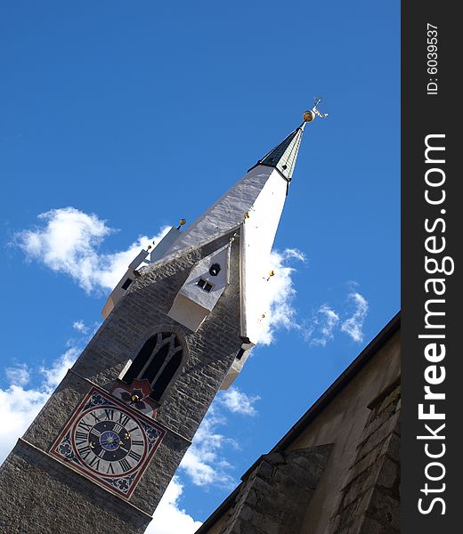 A glimpse of the Bressanone belltower of the ancient cathedral