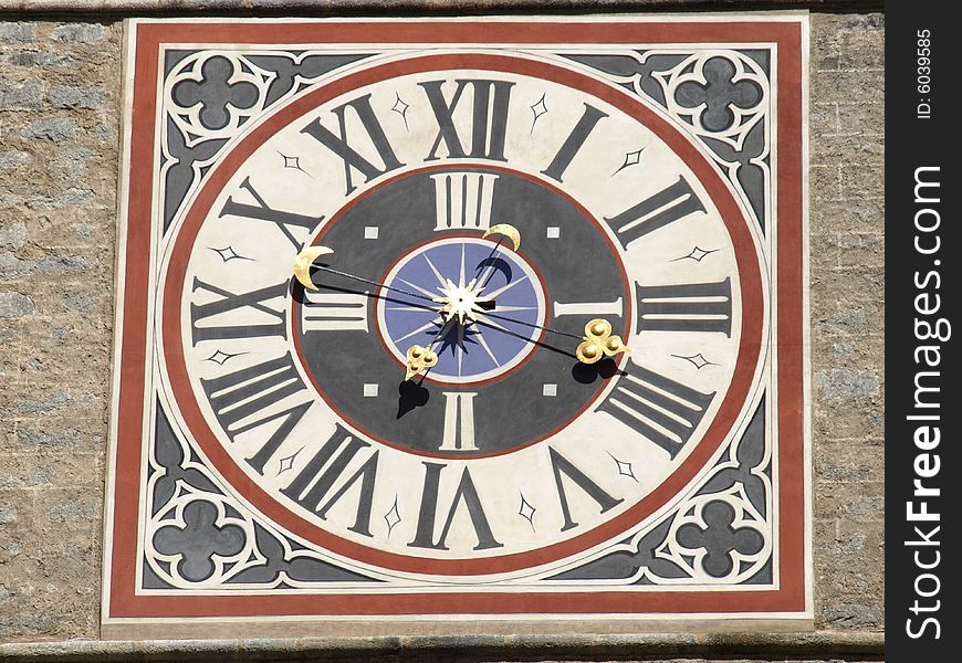 A beautiful shot of the clock of the Bressanone belltower. A beautiful shot of the clock of the Bressanone belltower