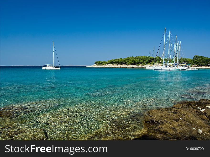 Sail boats docked in beautiful bay, Adriatic sea