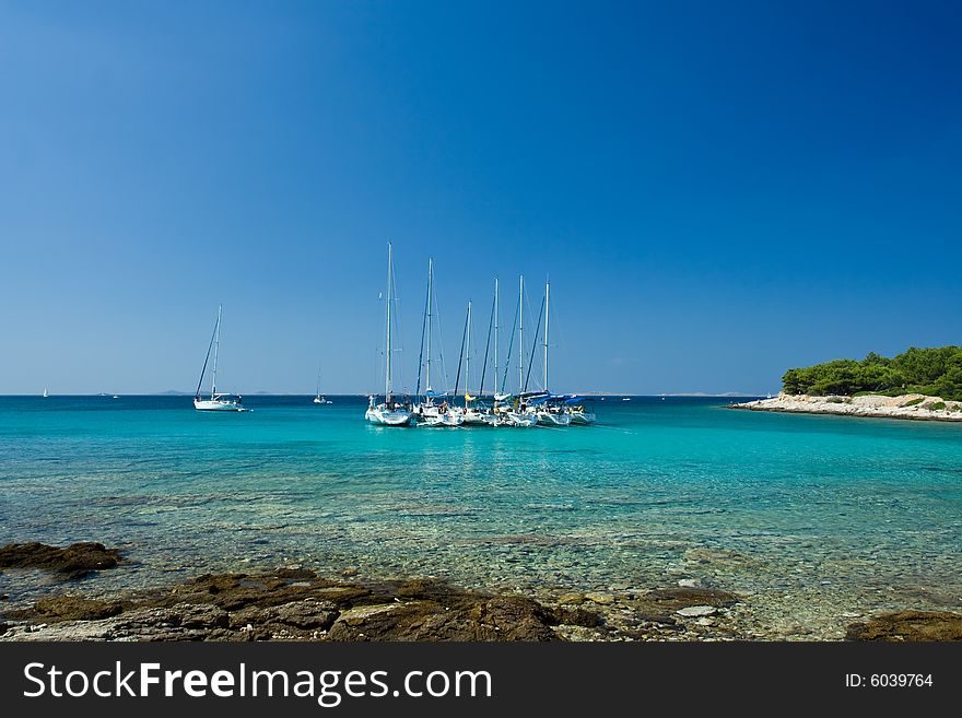 Sail boats docked in beautiful bay, Adriatic sea, Croatia