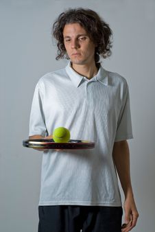 Man With Tennis Racket And Ball - Vertical Royalty Free Stock Photos