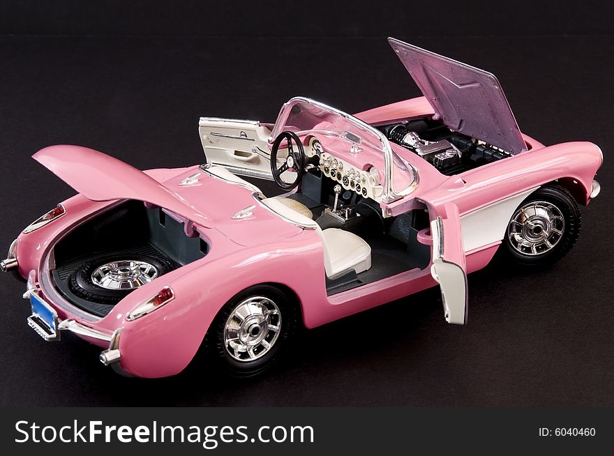 Pink stylish classic sports car