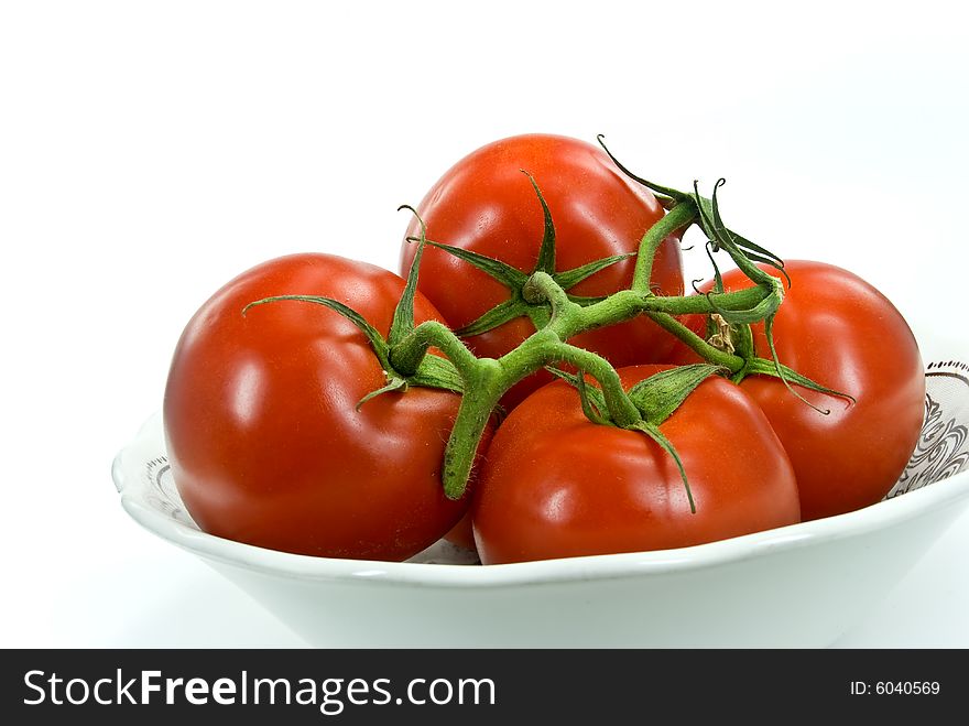 A Stack Of Tomatoes  On White Background