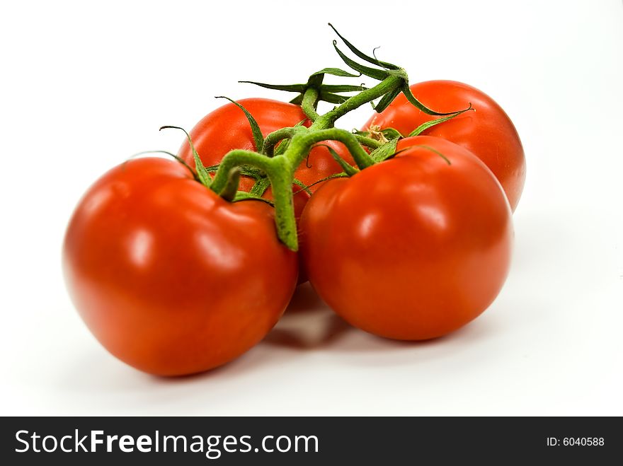 A Stack Of Tomatoes  On White Background