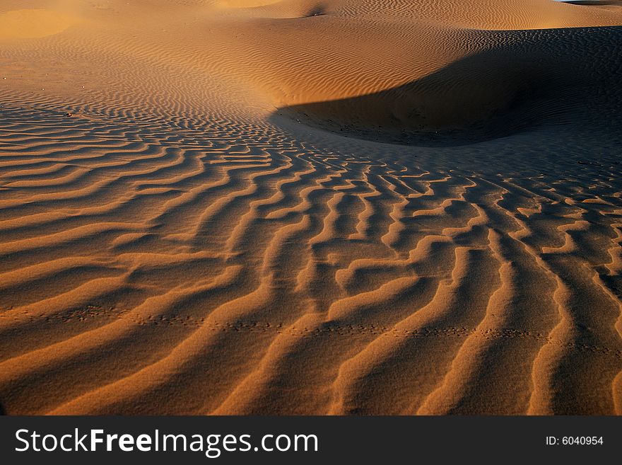 Sunrise over the Curves in desert of Jaisalmer,Rajastan, India. Sunrise over the Curves in desert of Jaisalmer,Rajastan, India