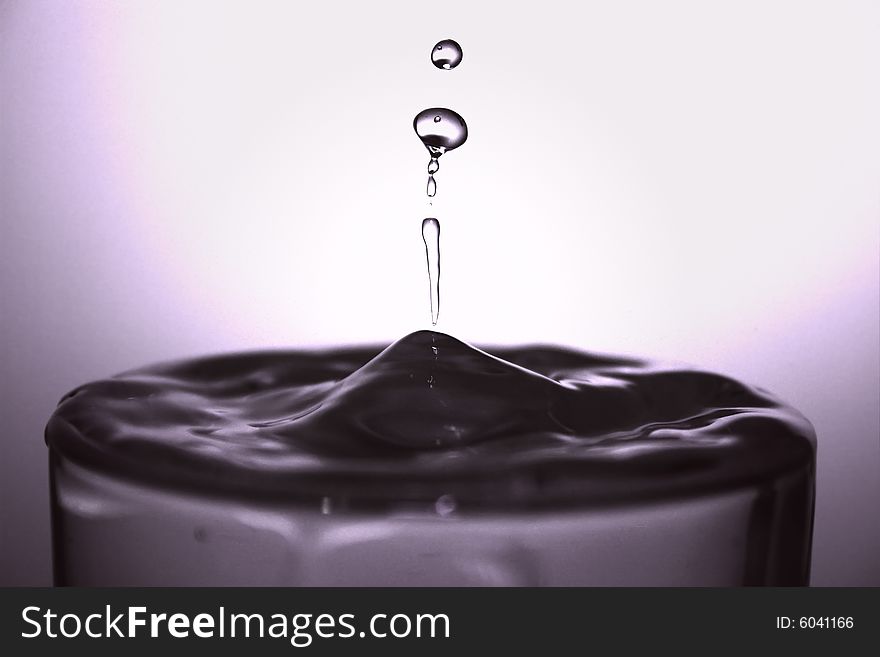 An studio isolated detail of a drop of water