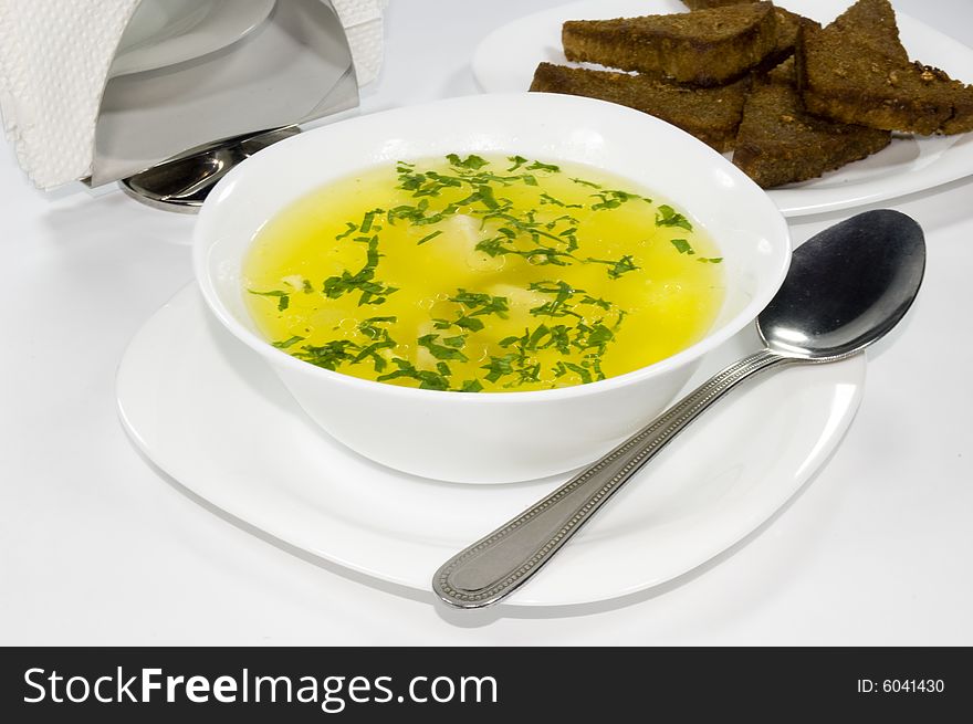 The soup with rye bread, isolated. The soup with rye bread, isolated