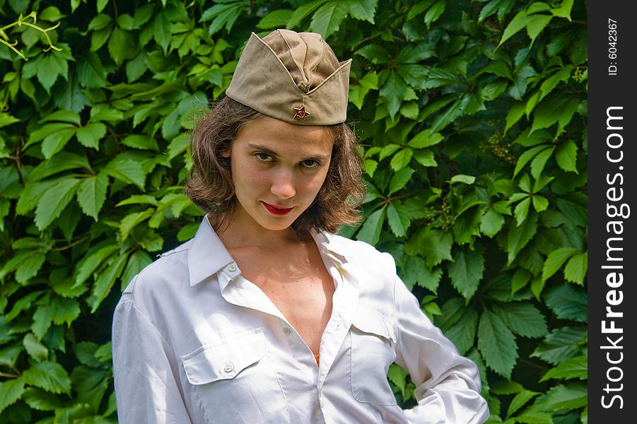 Beautiful girl wearing a soviet soldier cap