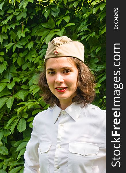 Beautiful girl wearing a soviet soldier cap