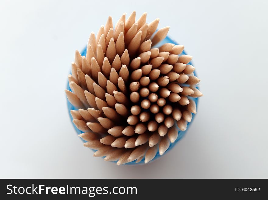 Isolated toothpicks on gray background