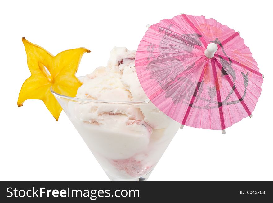 Ice-cream with slice of carambola in a glass on a white background. Ice-cream with slice of carambola in a glass on a white background.