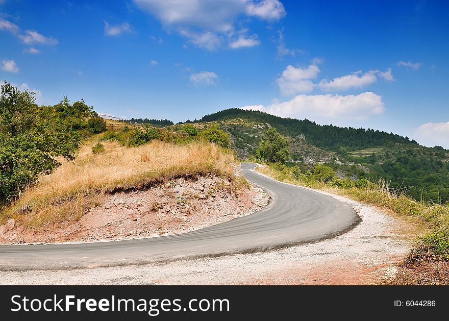 A mountain road with cloudy sky, Bulgaria