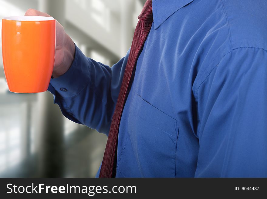 Men having a cup of coffee at work. Men having a cup of coffee at work