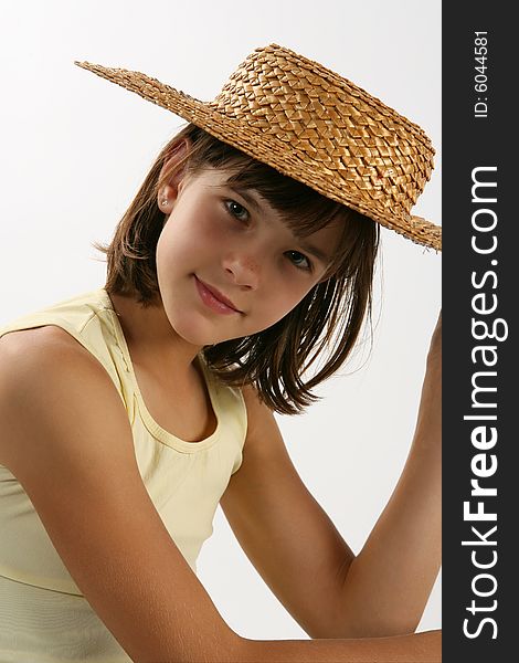 Girl with straw hat portrait. Girl with straw hat portrait