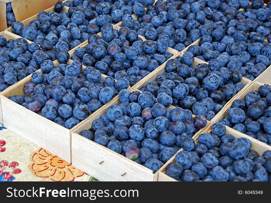 Fresh summer blueberries at the market. Fresh summer blueberries at the market.