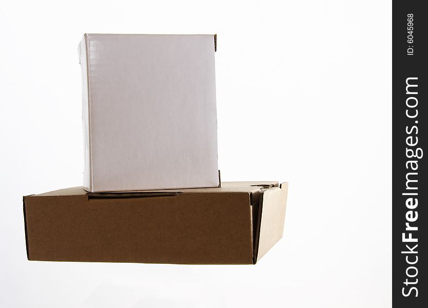 Brown and white cardboard boxes strong packaging for sending items through the post