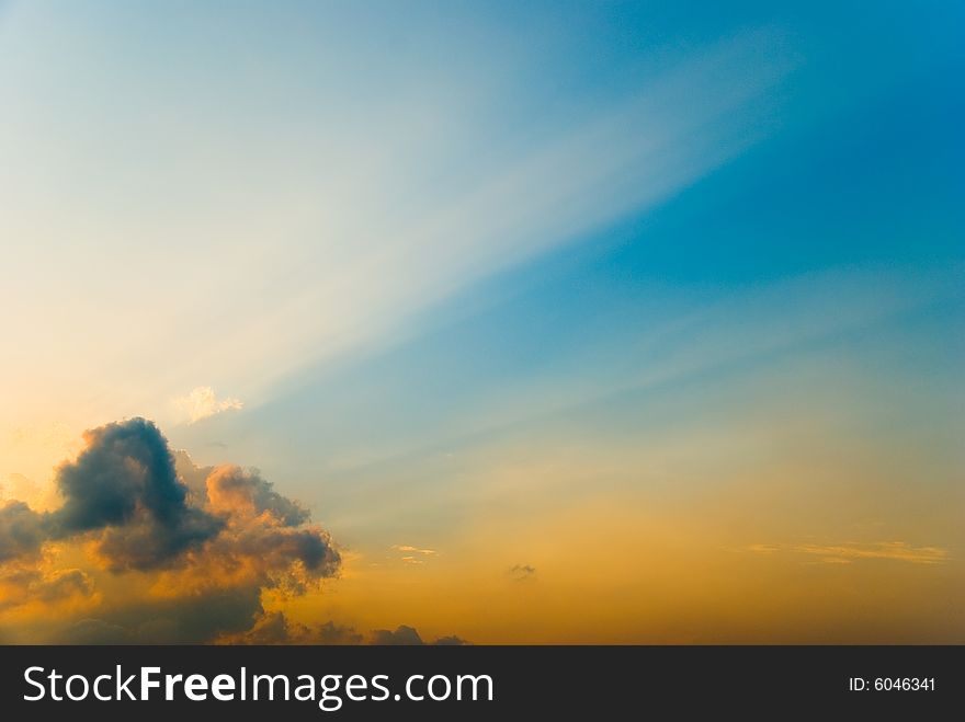 Cloud casting its shadow in the sky at sunset. Cloud casting its shadow in the sky at sunset