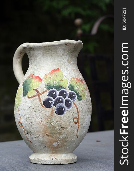 Old hand painted wine jug