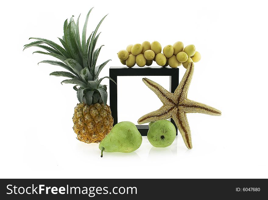 Composition at a black framework pineapple and a starfish. Composition at a black framework pineapple and a starfish