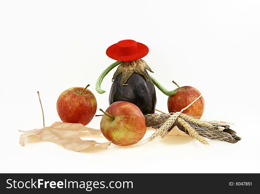 Composition from three red apples and an eggplant. Composition from three red apples and an eggplant