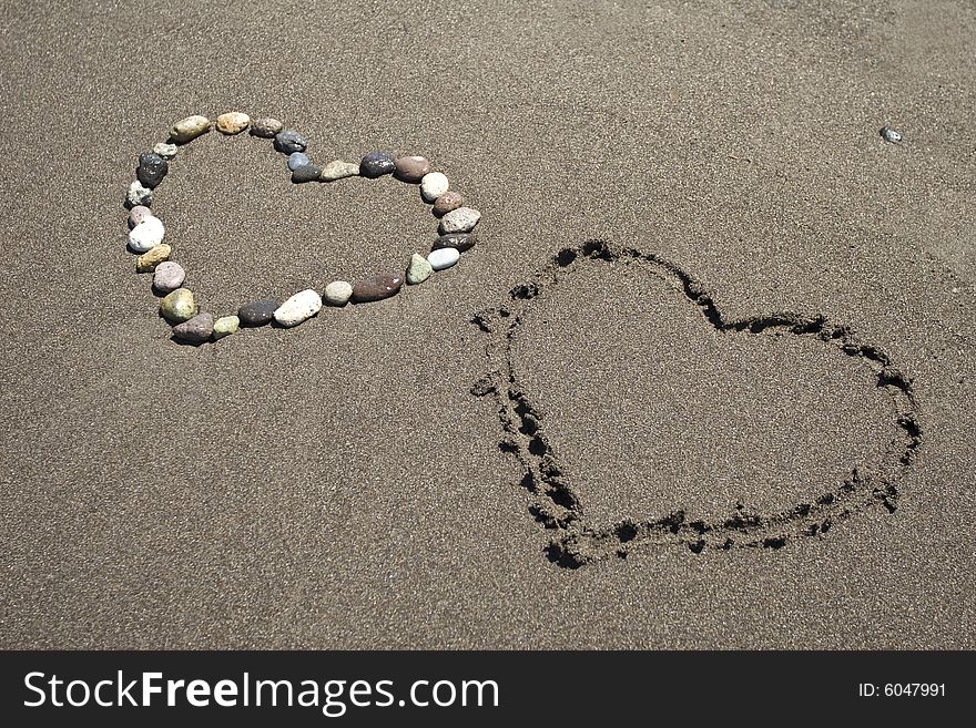 "love"in the sandy beach in Greece
