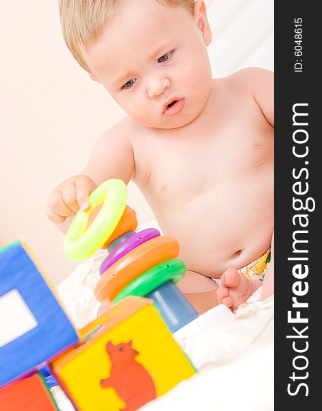 Cute Little Boy With Cubes Toy