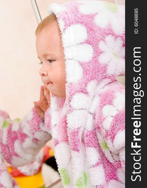 Cute Baby With Terry Bathrobe Looking At Mirror