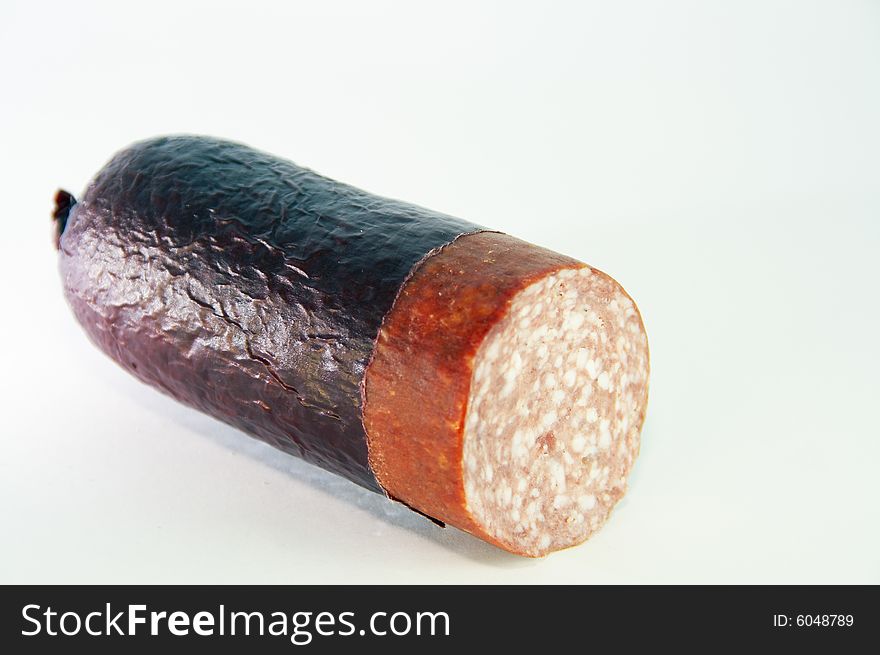 Stick of smoked Russian sausage