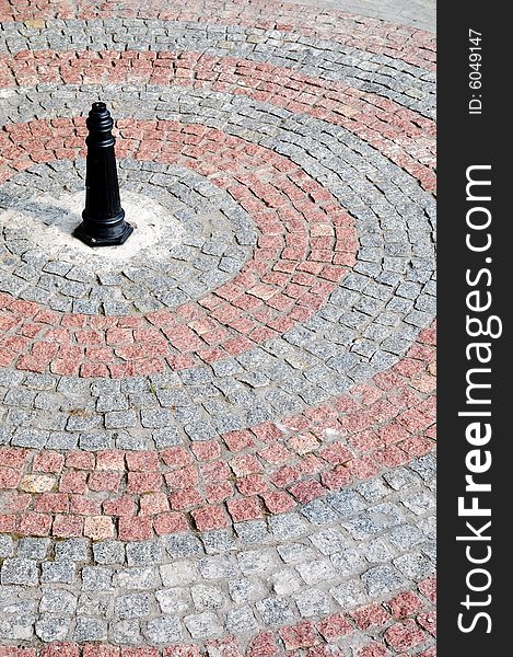 Cobblestone made of red and gray granite. Cobblestone made of red and gray granite