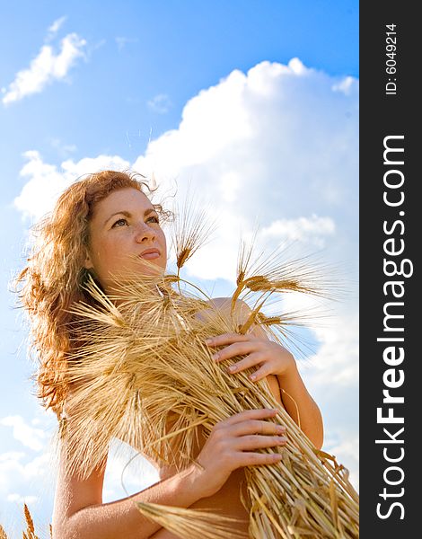 Beautiful caucasian model with golden wheat bouquet. Beautiful caucasian model with golden wheat bouquet