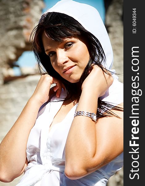 Smiling woman in white hood