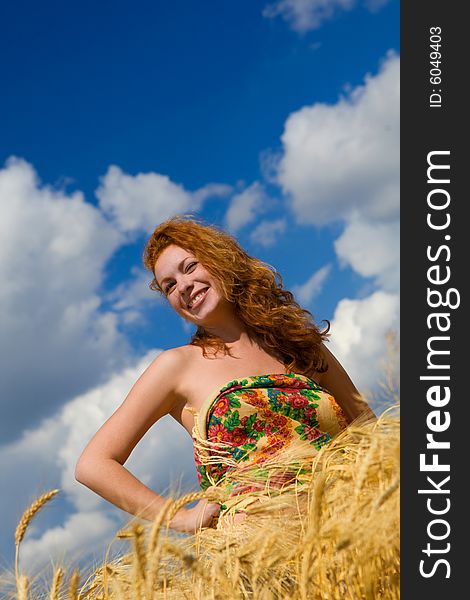 Beautiful caucasian model in golden wheat field. Beautiful caucasian model in golden wheat field