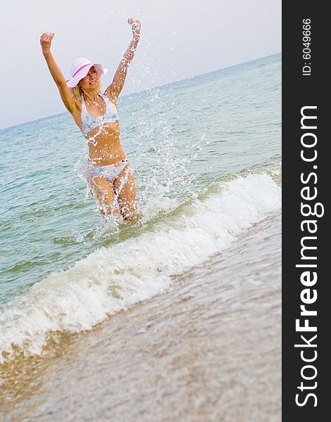 Beautiful girl at sea beach