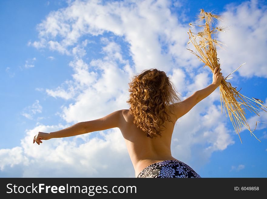 Beautiful caucasian model with golden wheat bouquet. Beautiful caucasian model with golden wheat bouquet