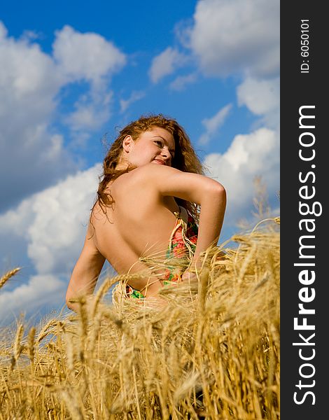 Beautiful Model In Golden Wheat Field