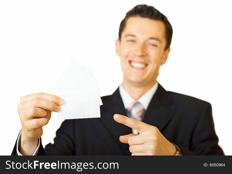Young businessman holding blank visit card. Backside. Isolated. Young businessman holding blank visit card. Backside. Isolated.